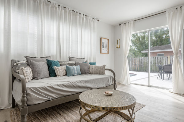 Sunroom with twin bed and Pool access