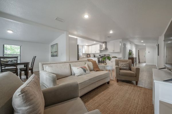Open concept Living room with views of kitchen and dining rooms