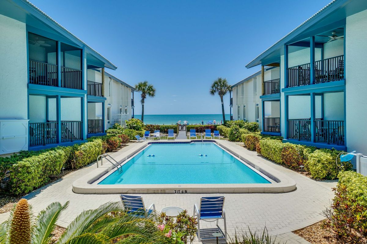 View From Patio of Community Pool With Beach Access
