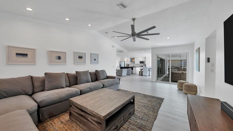 Relax on the comfortable couch 
85” Smart TV