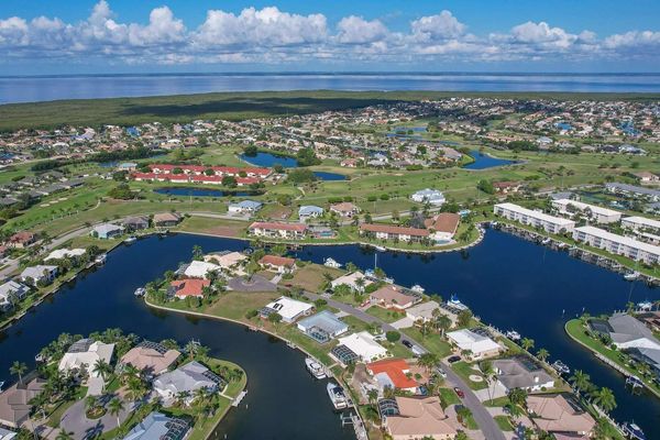 Popular Bird Section canalfront home in Punta Gorda Isles (Boat lift not available)