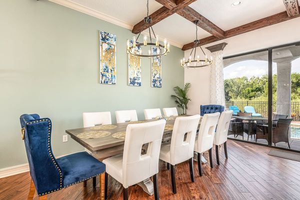 The second of two formal dining tables offers seating for 10