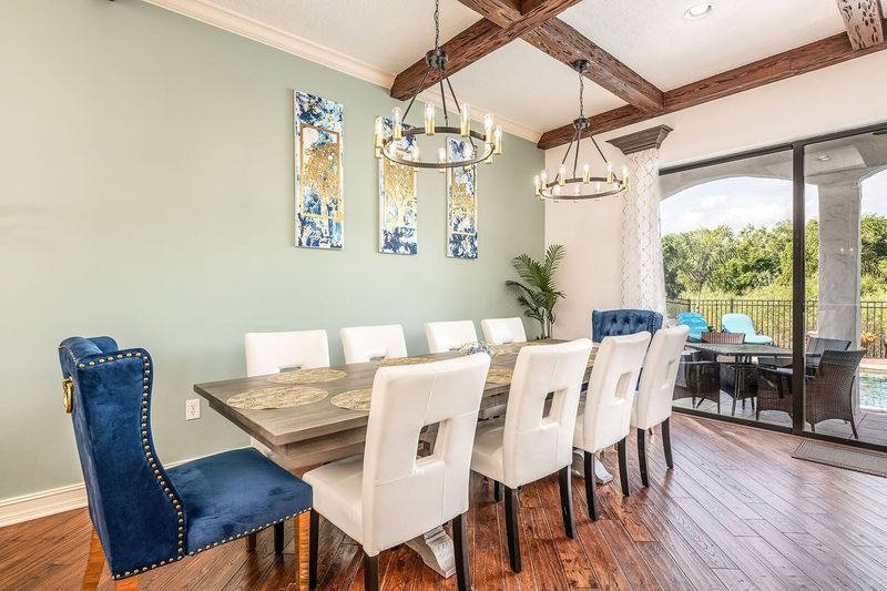 The second of two formal dining tables offers seating for 10