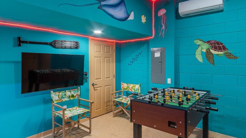 Game Room Downstairs
55" Smart TV
PlayStation 4 (One controller), Foosball Table, Air Hockey Table, and has A/C