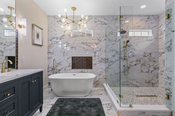 Large walk in shower with double shower heads.