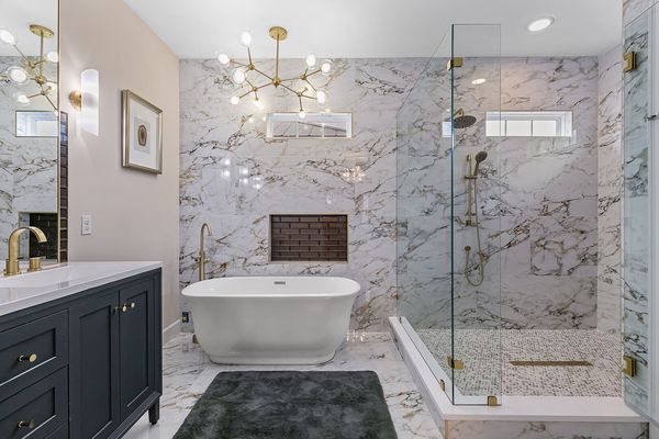 Large walk in shower with double shower heads.