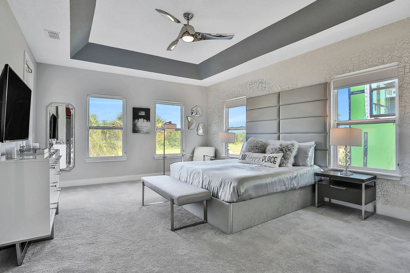 Large en suite with balcony access and views of the golf course