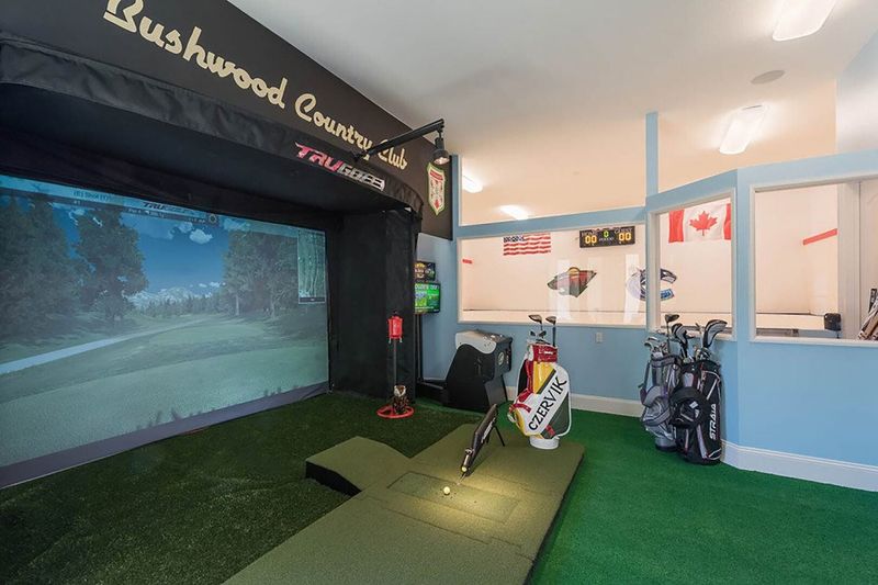 The golf simulator and synthetic ice rink are such unique and fun features of this home