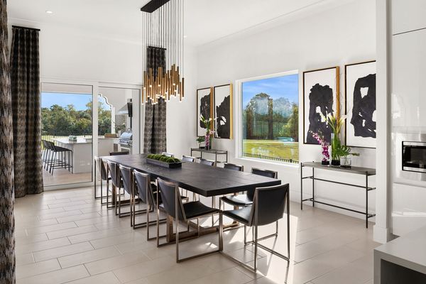 The formal dining table with a view is perfect for enjoying delicious meals