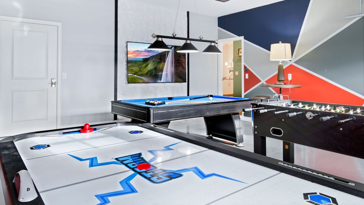 Game Room Downstairs Has AC
75" Smart TV