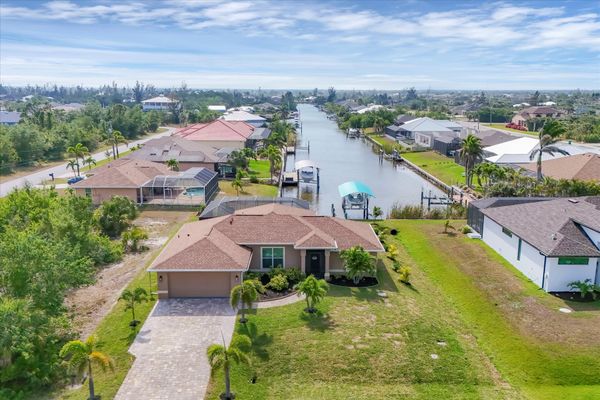 Beautiful South Gulf Cove waterfront home with private pool (Boat lift not available)
