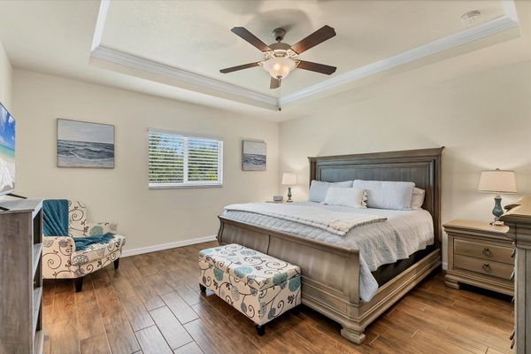 Primary bedroom with king bed and en suite