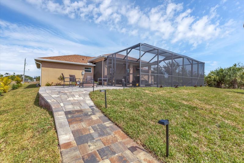 Backyard leading to dock and canal (Boat lift not available)