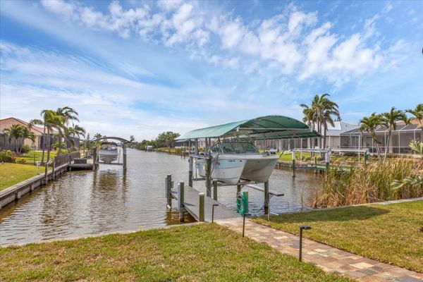 Backyard leading to dock and canal (Boat lift not available)