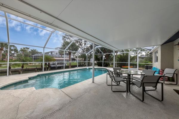 Poolside relaxation overlooking the canal
