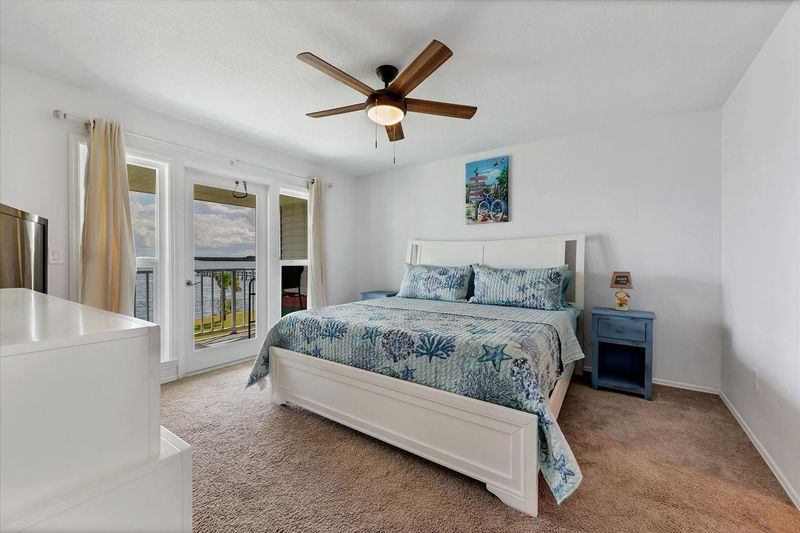 King master bedroom with patio access