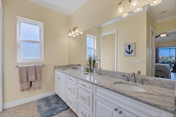 En suite features walk-in shower & double vanities