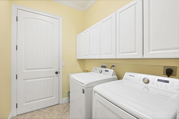 Laundry room with full-size washer & dryer