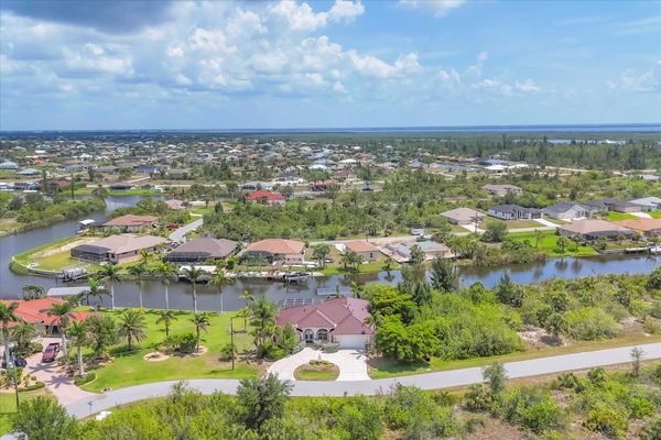 Beautiful South Gulf Cove home with private pool, hot tub, and canal access (Boat lift not available)