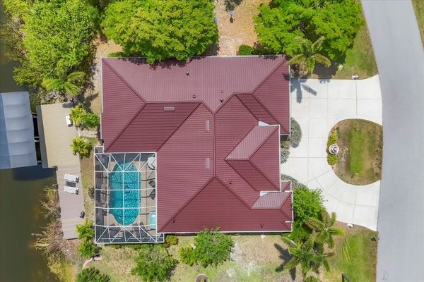 Beautiful South Gulf Cove home with private pool, hot tub, and canal access (Boat lift not available)