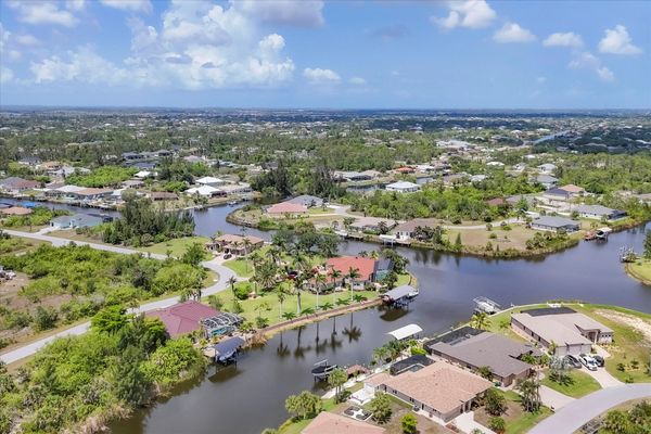 Beautiful South Gulf Cove home with private pool, hot tub, and canal access (Boat lift not available)