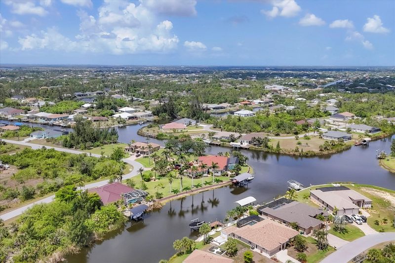 Beautiful South Gulf Cove home with private pool, hot tub, and canal access (Boat lift not available)