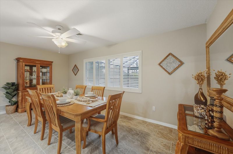 Dining area. Dining table seats 6 with additional seating for 3 at the kitchen island
