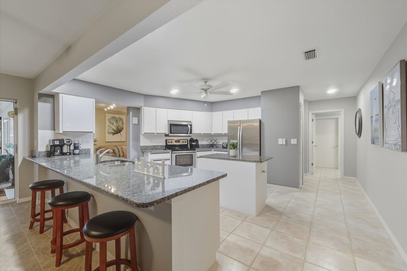 Bright, open, fully-equipped kitchen