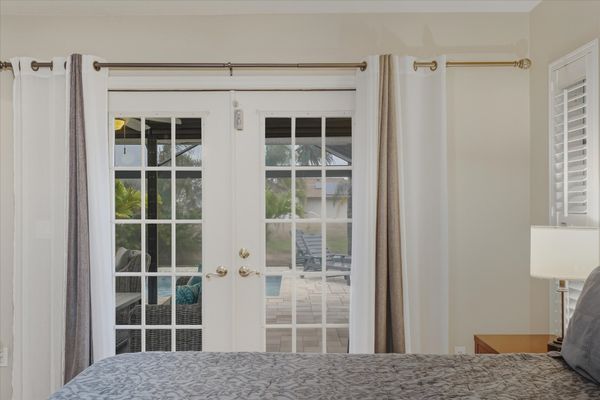 Bedroom 1 - Primary bedroom with king bed, attached bathroom, lanai access