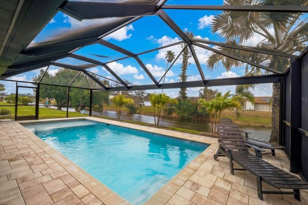Sparkling private pool overlooking canal