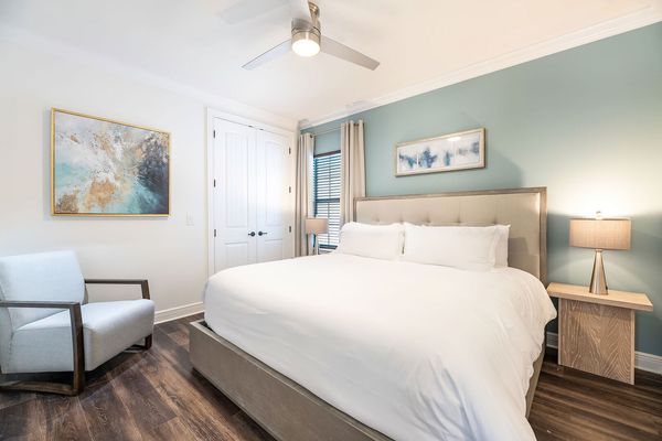 Retreat to this bedroom with a king-sized bed and shared en suite bathroom