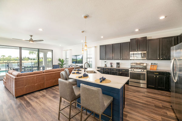 The breakfast bar provides additional seating for 5