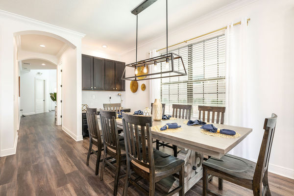 The dining room table offers seating for 8