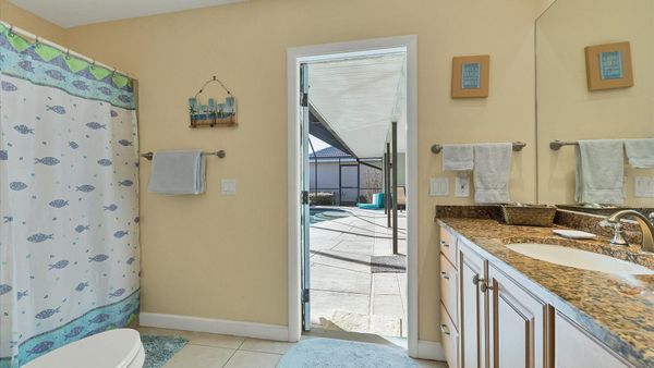 Guest bathroom with patio access