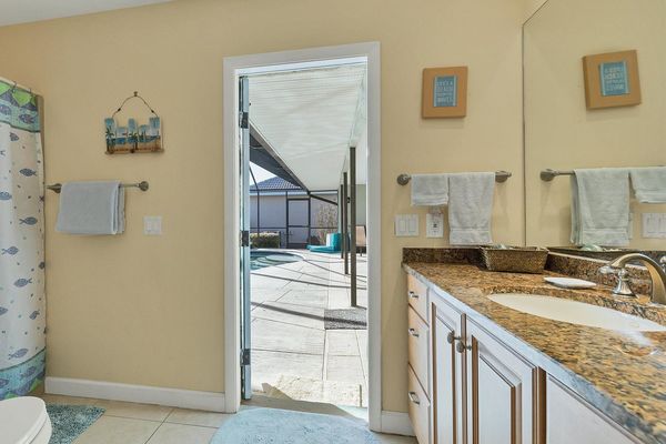 Guest bathroom with patio access