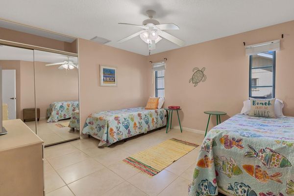 Two twin bedroom- twin trundles underneath each bed