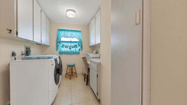 Full size washer and dryer in the laundry room