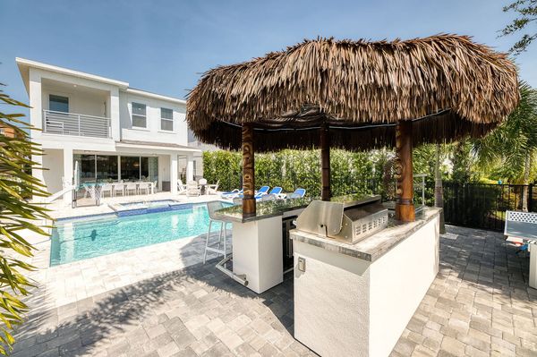 Take advantage of the Florida weather and grill out courtesy of your resort-style tiki bar with BBQ