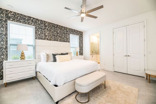 Ground floor master bedroom with a king-sized bed