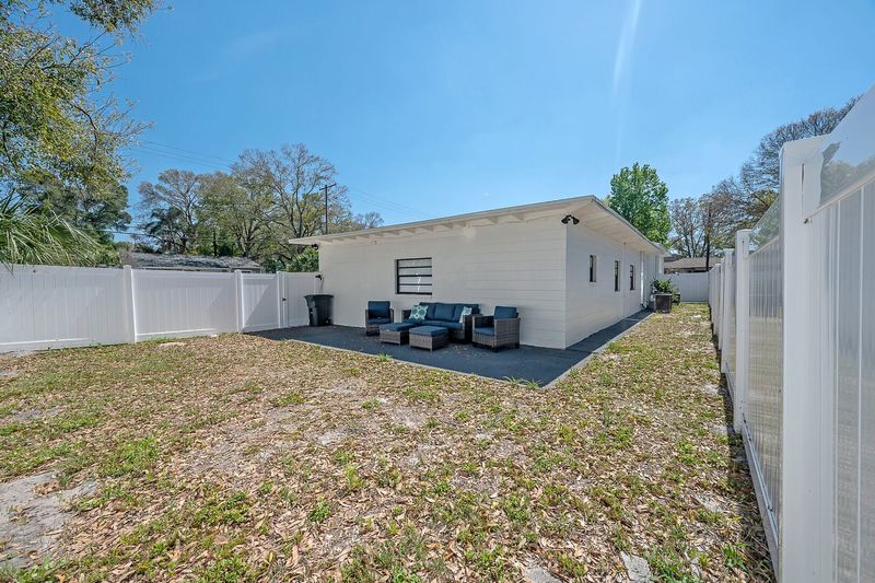 Fenced Yard with seating area