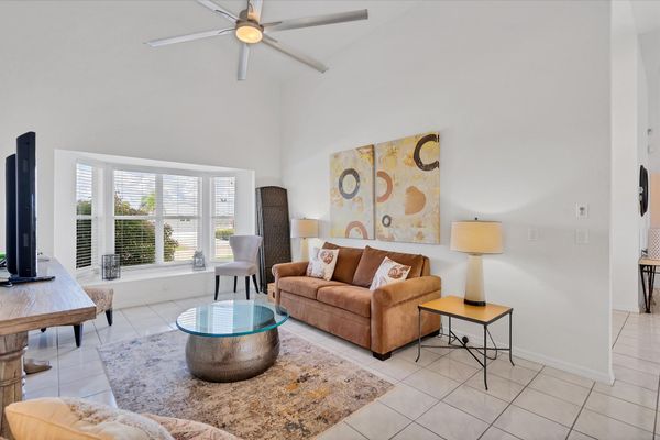 Den area with full size sleeper sofa. There is also a privacy panel that folds out to create a more private space