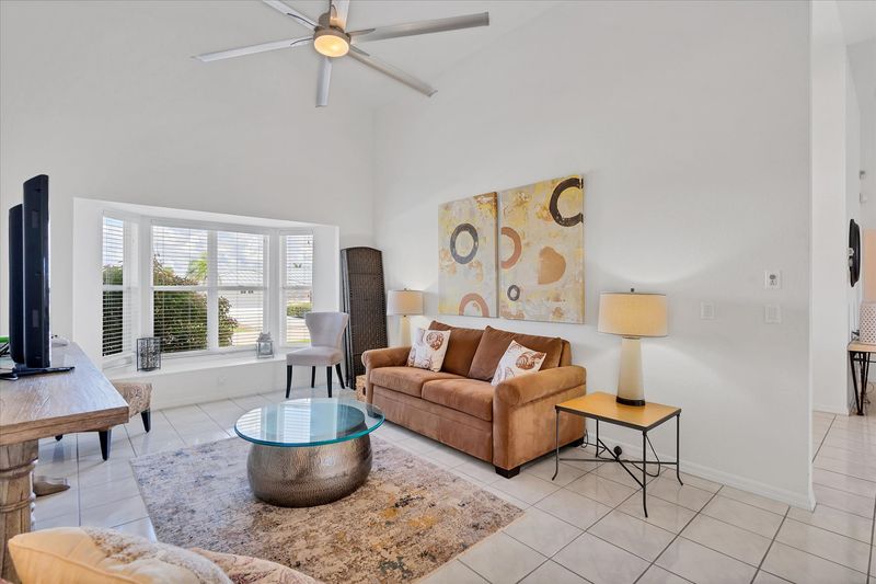 Den area with full size sleeper sofa. There is also a privacy panel that folds out to create a more private space
