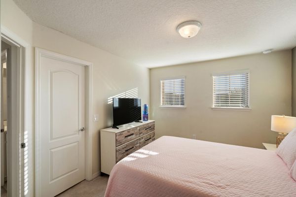 Queen Suite Bedroom 5 Upstairs Attached Bathroom Shower 43" Smart TV