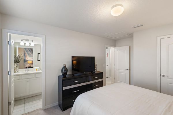 Queen Suite Bedroom 3 Upstairs Attached Bathroom 43" Smart TV