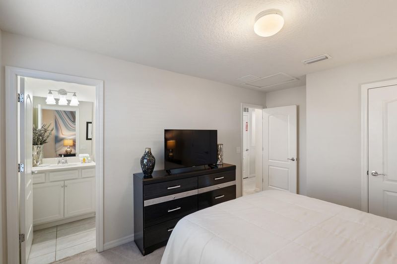Queen Suite Bedroom 3 Upstairs Attached Bathroom 43" Smart TV