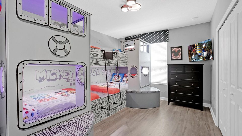 Four Double Beds 
Bunk Bedroom 4 Upstairs
Mickey Theme
43" Roku TV