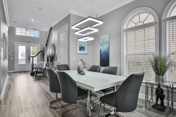 The formal dining table comfortably seats 8