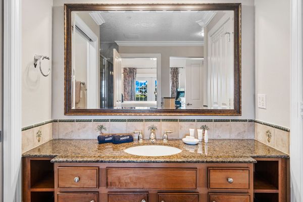 Enjoy the convenience of an en-suite bathroom featuring a walk-in shower for a refreshing start to your day