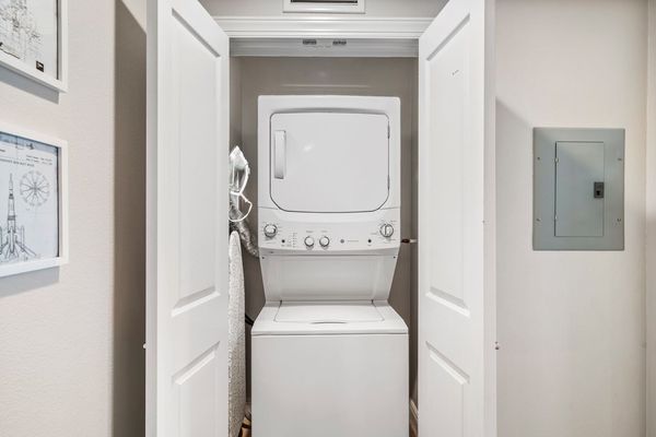 Throw in a load of laundry in the stackable washer and dryer