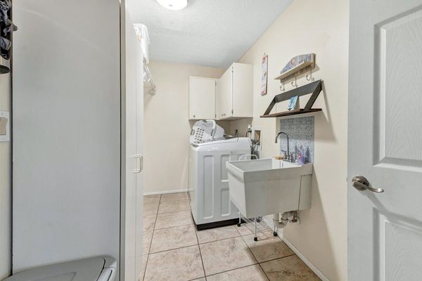 Full size washer and dryer in laundry room